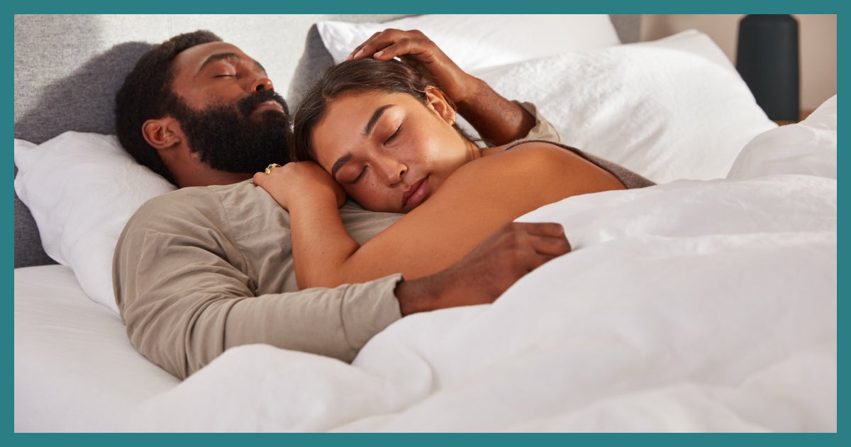Couple Relaxing in Cozy Bedroom Setting