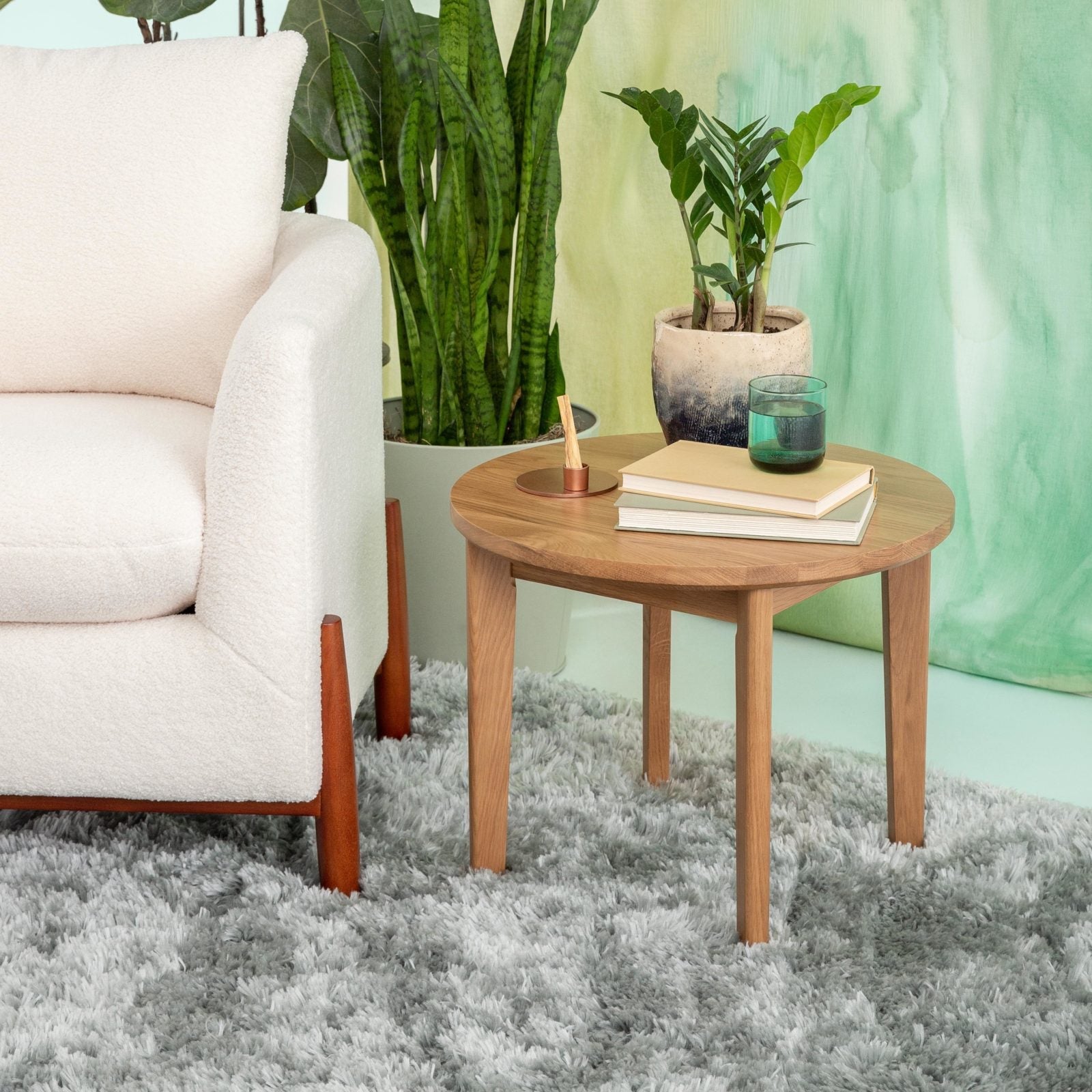 Modern armchair with wooden side table