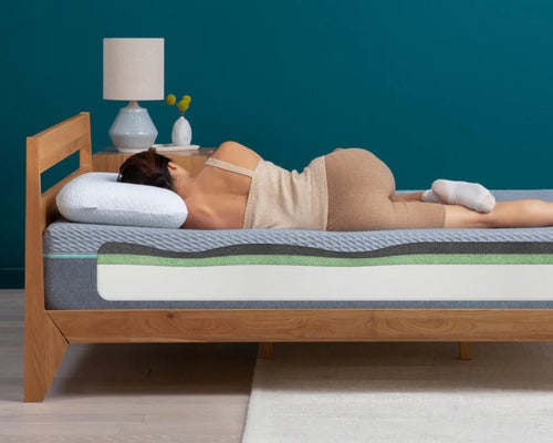 Woman Sleeping on Memory Foam Mattress