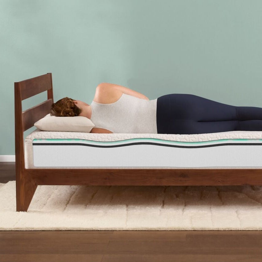 Woman sleeping on modern foam mattress