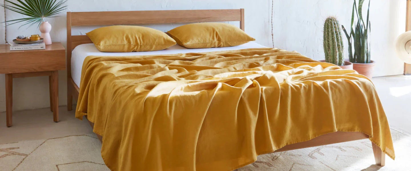 Modern bedroom with mustard yellow bedding