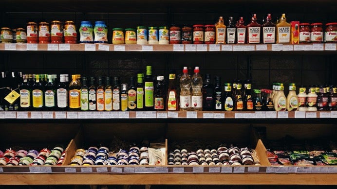 Grocery store shelf with assorted products
