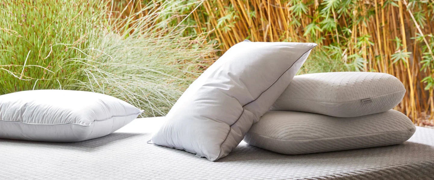White pillows on outdoor bed setting