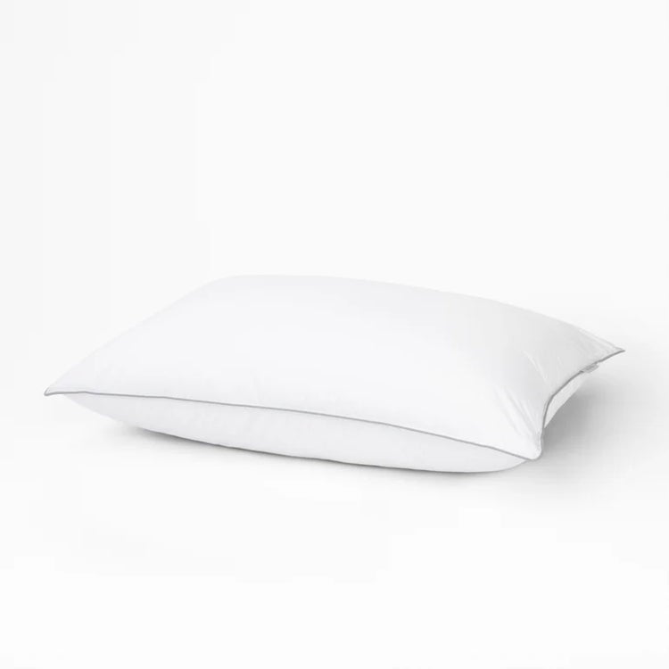 White pillow on plain background