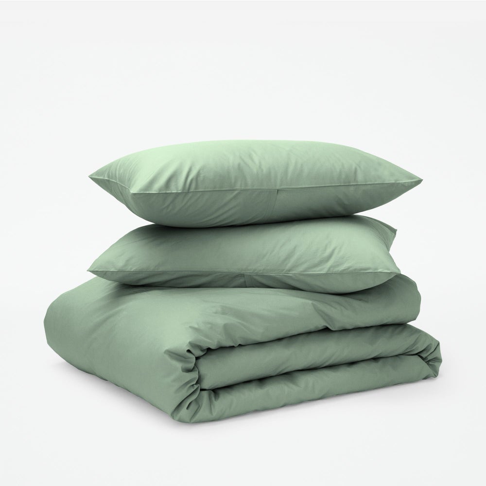 Green bedding set with pillows and duvet