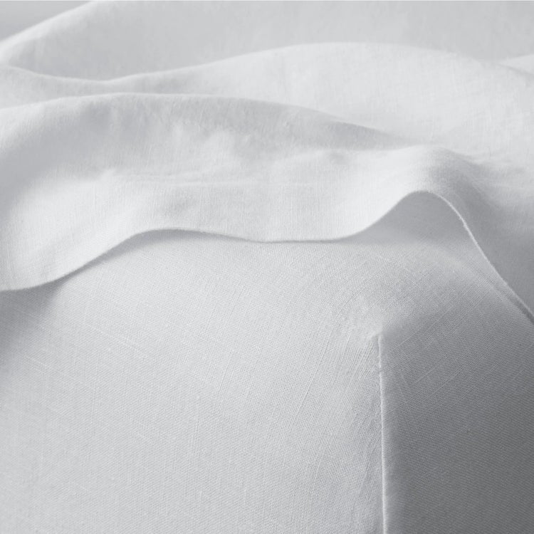 White Linen Fabric Draped on Surface