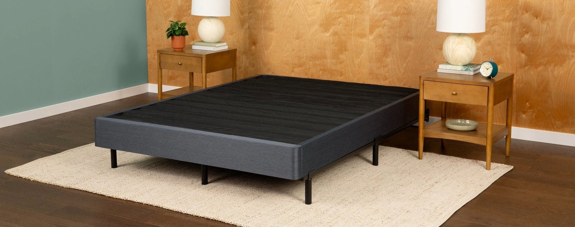 Minimalist bed frame in modern bedroom