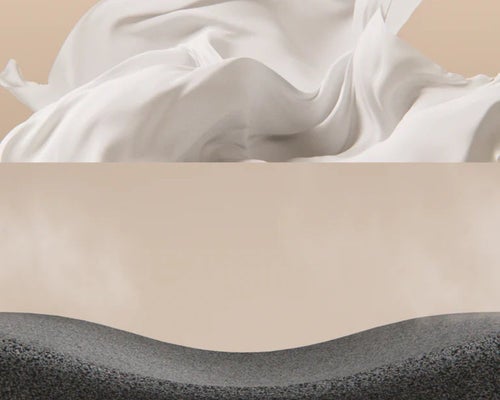 Flowing white fabric over textured surface