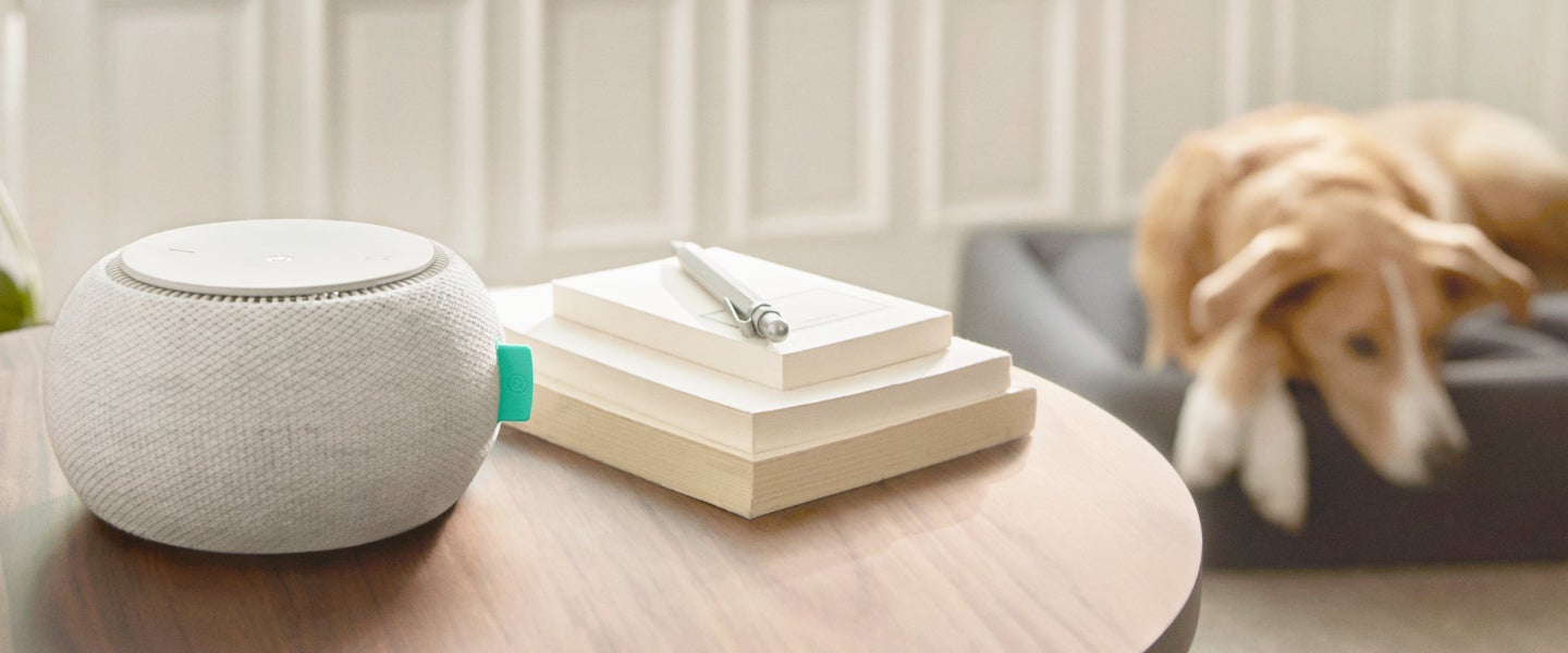 Smart speaker on table in cozy room
