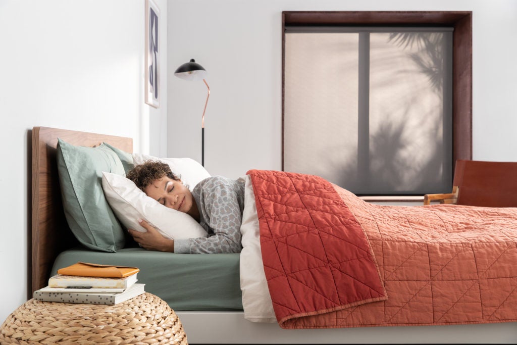 Cozy Bedroom with Orange Quilt