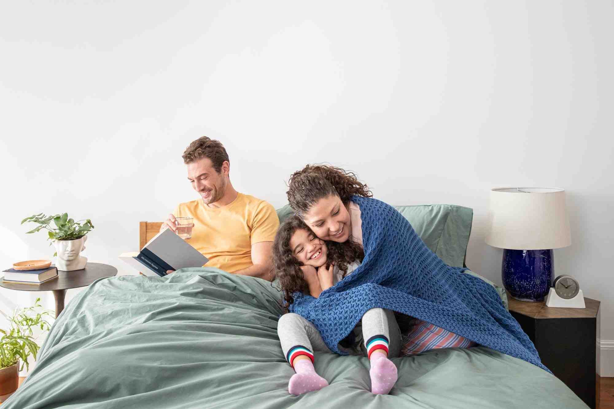 Cozy family moment in bedroom setting