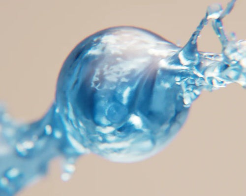 Close-up of blue water splash motion