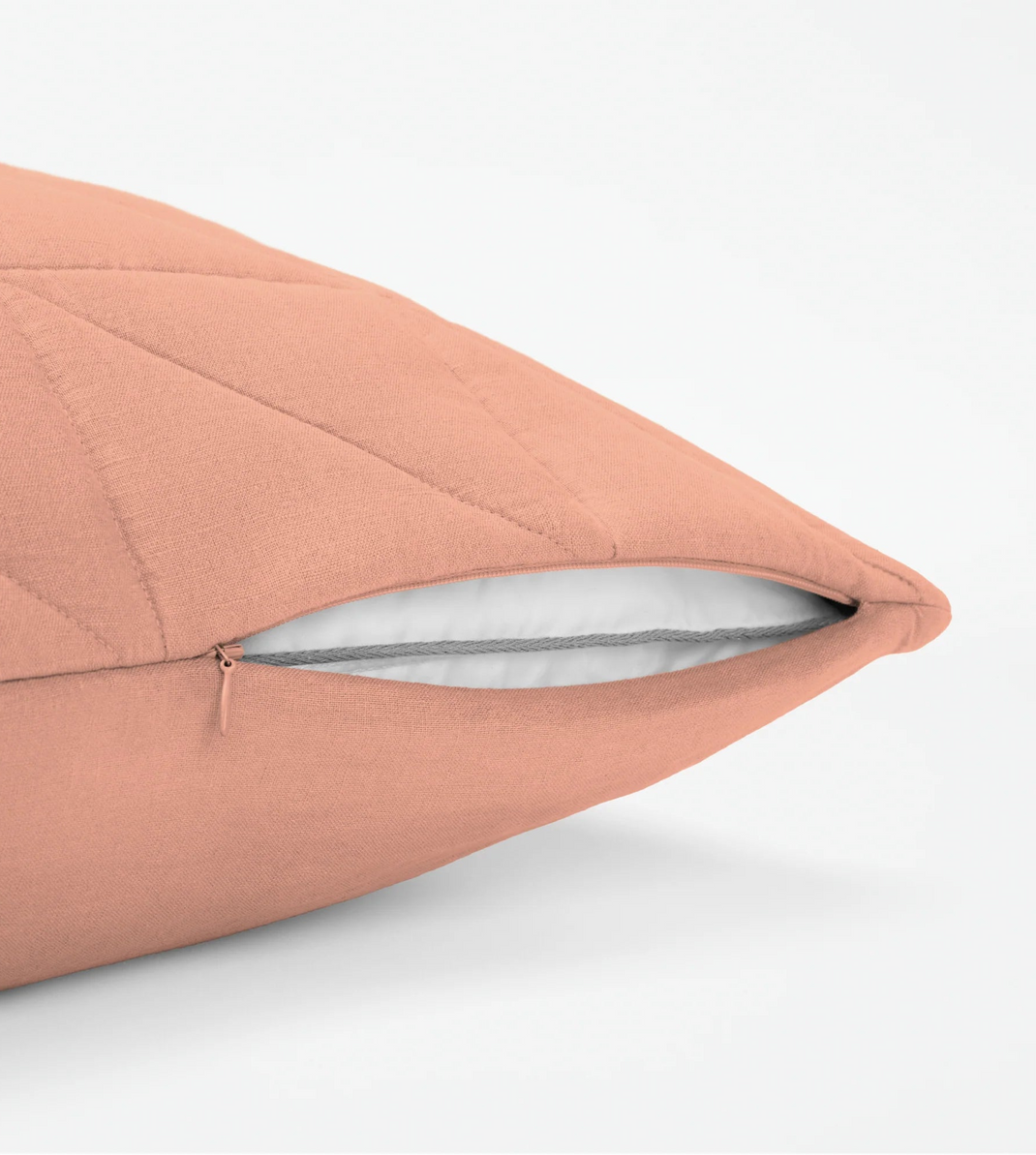 Close-up of pink quilted pillow