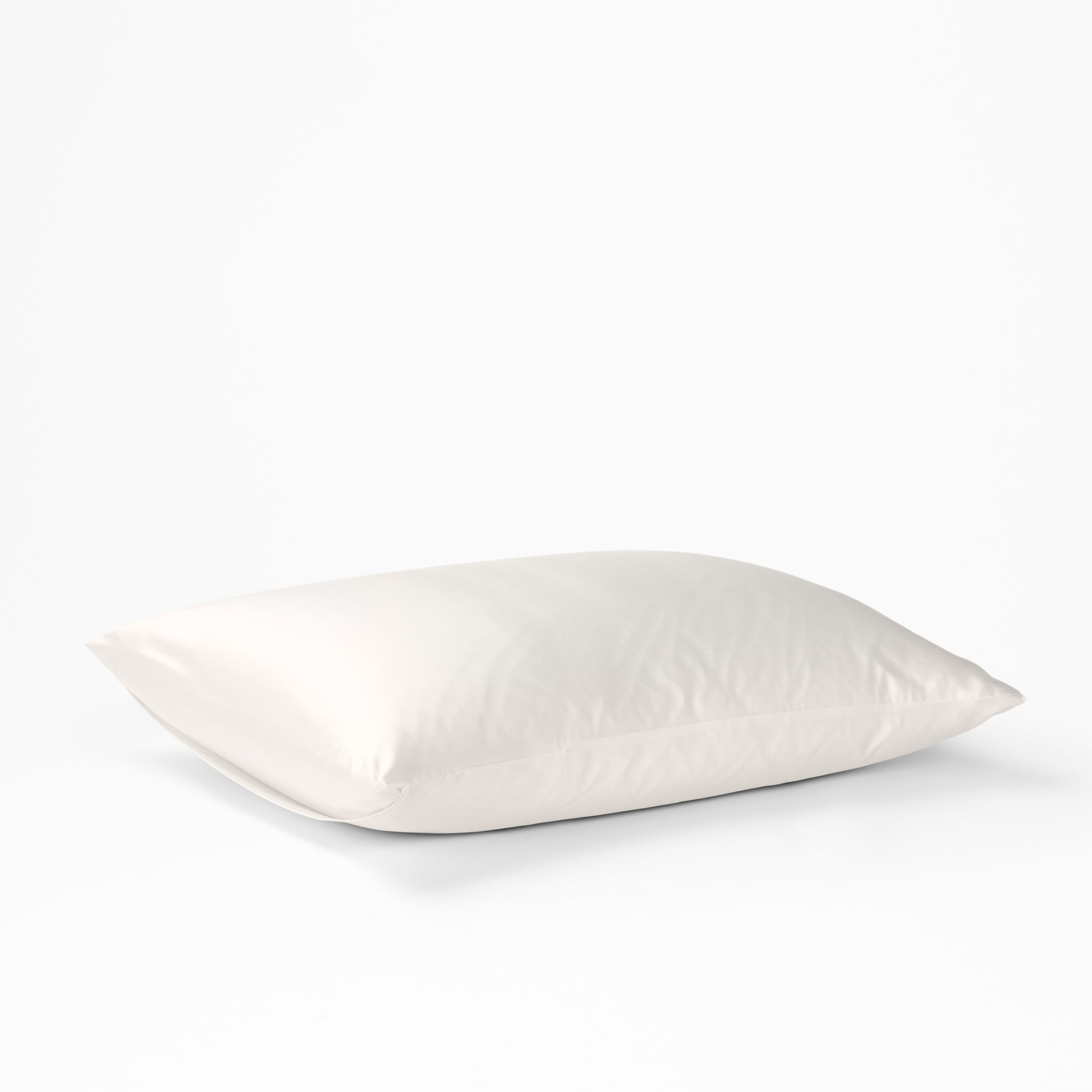 The Tuft and Needle Silk Pillowcase on a white background||color:cloud